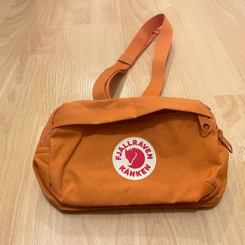 Orange Fjallraven Kanken Hip Pack.